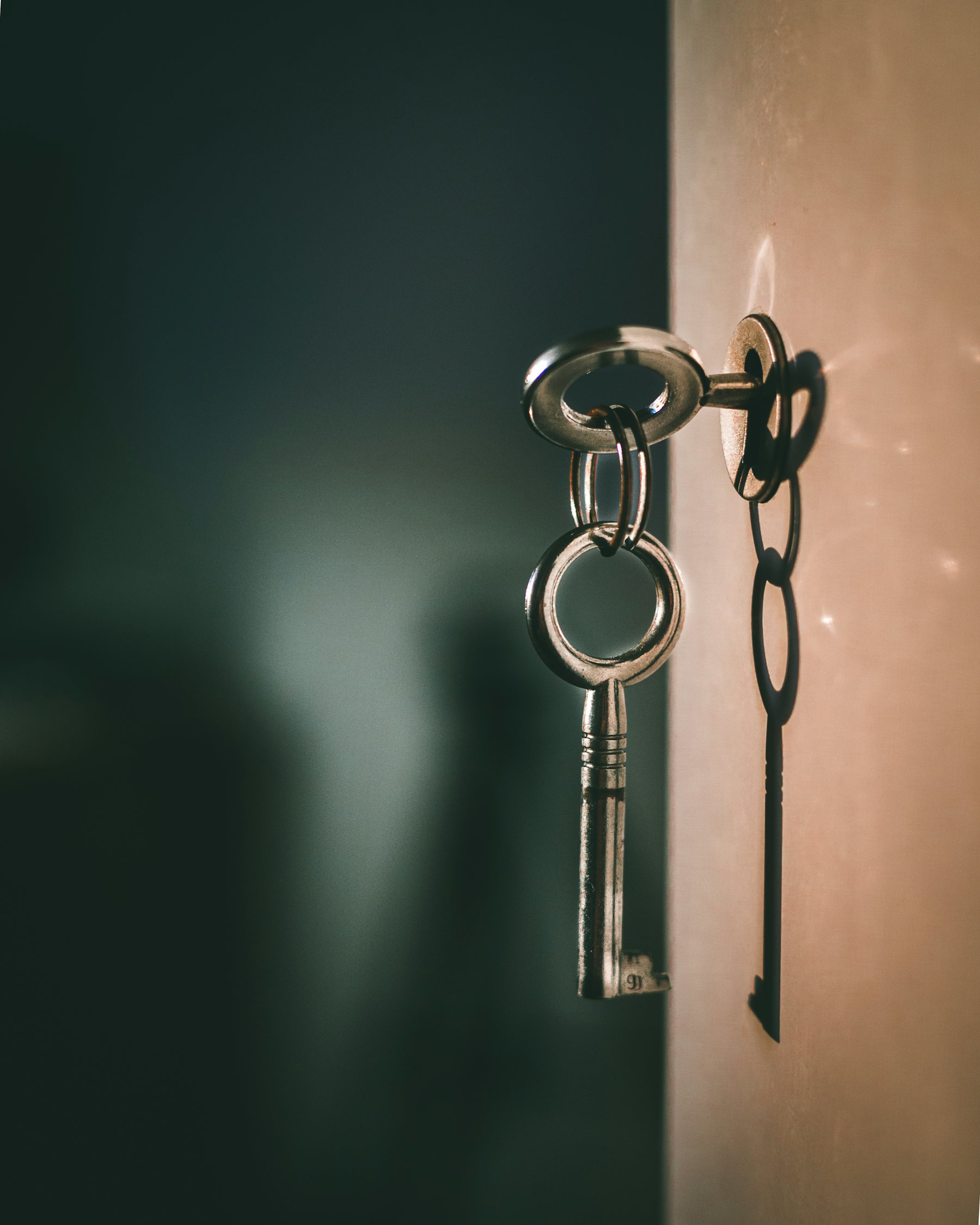 An old key resting in a keyhole